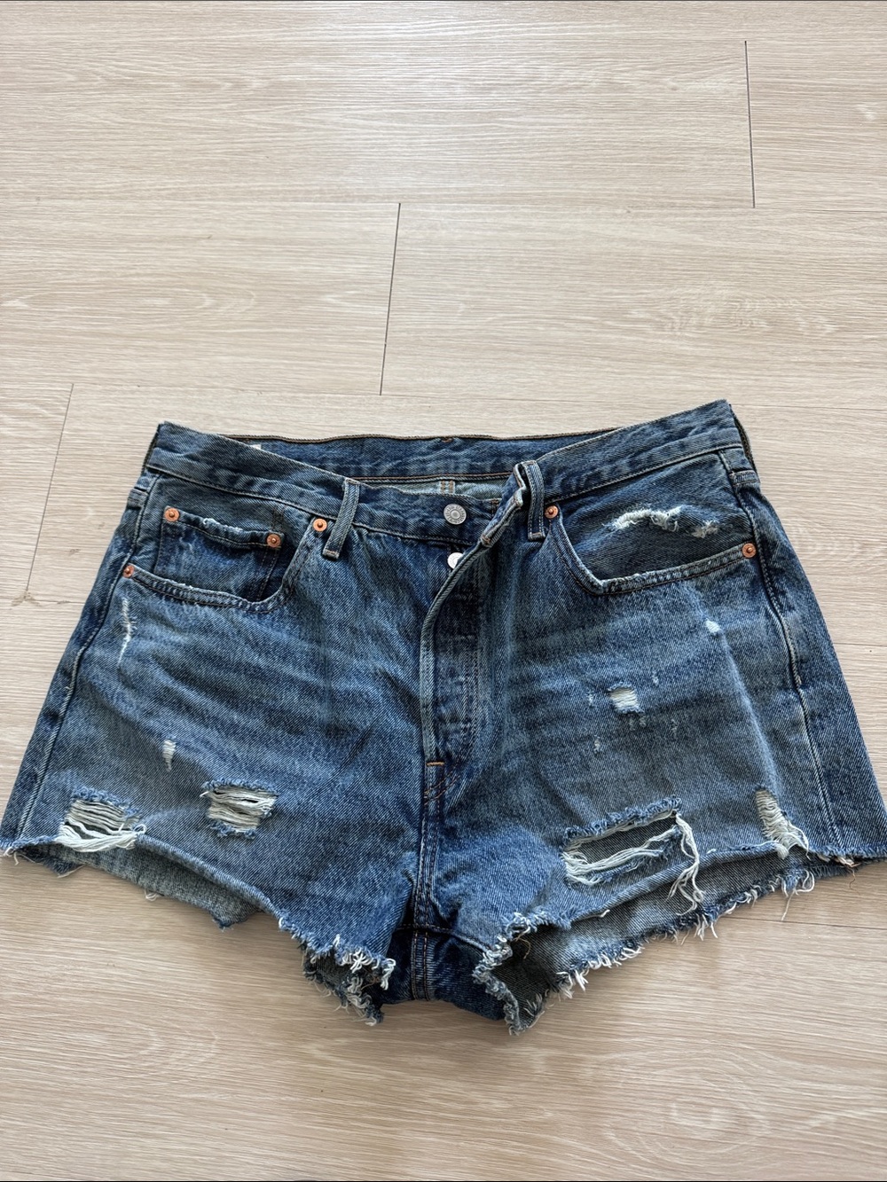 Levi's Distressed Dark Blue Denim Cutoff Shorts